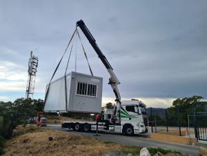 Levage en bras de grue de modules 
